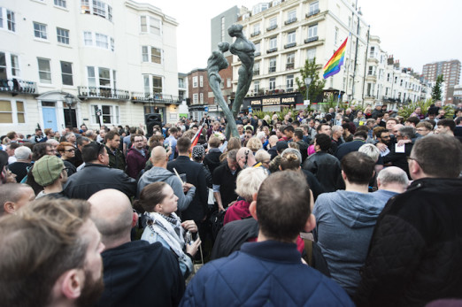 Brighton, East Sussex, 13th June 2016. LGBTQ communities gather for a procession and vigil at Brighton’s Aids Memorial Sculpture at New Steine in Kemptown, in memory of and in solidarity with the 49 people killed and others injured at Pulse gay bar in O