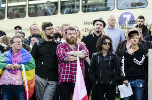 Brighton, East Sussex, 13th June 2016. LGBTQ communities gather for a procession and vigil at Brighton’s Aids Memorial Sculpture at New Steine in Kemptown, in memory of and in solidarity with the 49 people killed and others injured at Pulse gay bar in O