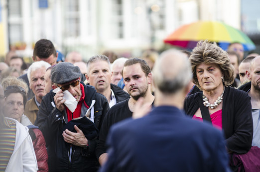 Brighton, East Sussex, 13th June 2016. LGBTQ communities gather for a procession and vigil at Brighton’s Aids Memorial Sculpture at New Steine in Kemptown, in memory of and in solidarity with the 49 people killed and others injured at Pulse gay bar in O