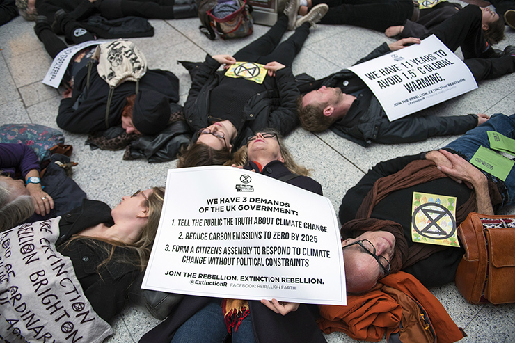 BRIGHTON EXTINCTION REBELLION ACTIVISTS STAGE ‘DIE-IN’ AT CHURCHILL SQUARE SHOPPING CENTRE