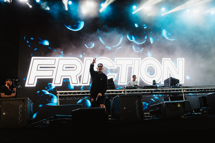 DJ Friction on stage at On The Beach Festival at night