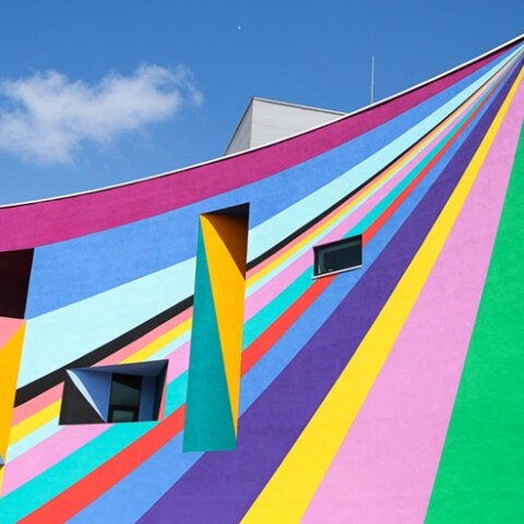 exterior view of the Towner gallery in Eastbourne with brightly colours geometric paintwork