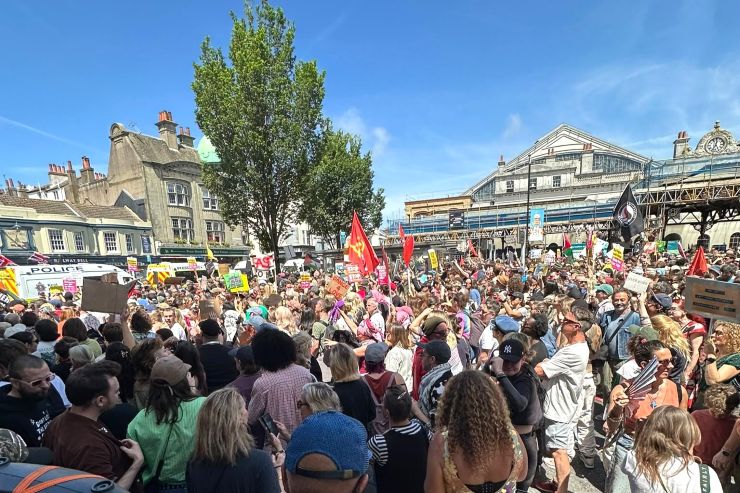The crowd outside Brighton train station at the Carnival Against Capitalism